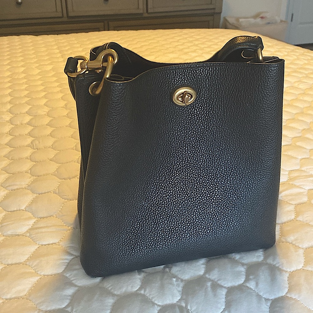 Small coach Crossbody in black with gold hardware